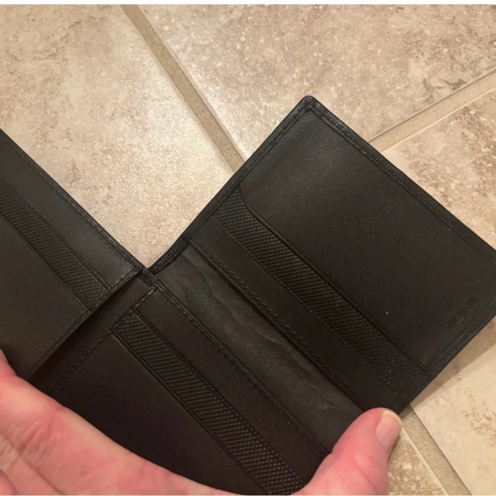 Tumi Black Textured Wallet new without tags in excellent condition